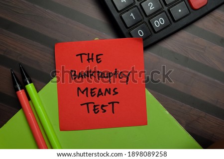 The Bankruptcy Means Test write on sticky notes isolated on Wooden Table.