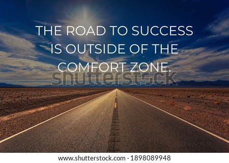 A motivational quote with wonderful background image. 'Road to success is outside of the comfort zone'
