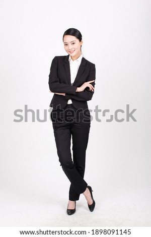 A young business woman in a suit high quality photo
