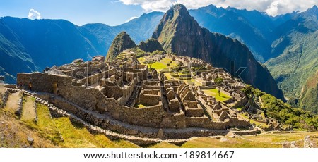 Panorama of Mysterious city - Machu Picchu, Peru,South America. The Incan ruins. Example of polygonal masonry and skill Royalty-Free Stock Photo #189814667