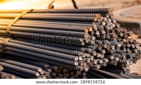 Reinforcement steel rod and deformed bar with rebar at construction site. Royalty-Free Stock Photo #1898158726