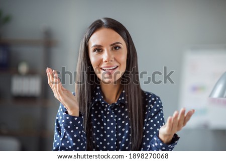 Photo of charming recruiter young woman talk take interview wear blue dotted short indoors in office workplace