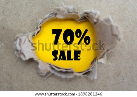 paper torn with word of 70% OFF