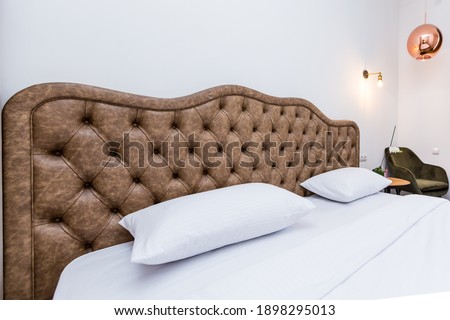 Interior photography, bedroom in a modern style in white
