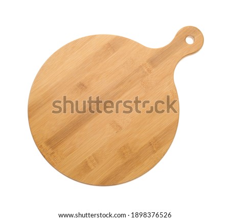 New wooden board isolated on white. Cooking utensils