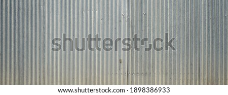 Old galvanized sheet wall with rust background Royalty-Free Stock Photo #1898386933