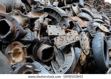 Old car parts store. Place a pile of used car parts.