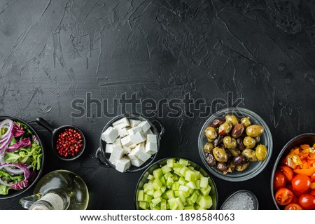 Ingredients, for greek salad, on black background, top view flat lay with copy space for text