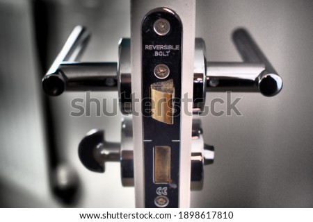 Door handle cross-section and lock Royalty-Free Stock Photo #1898617810