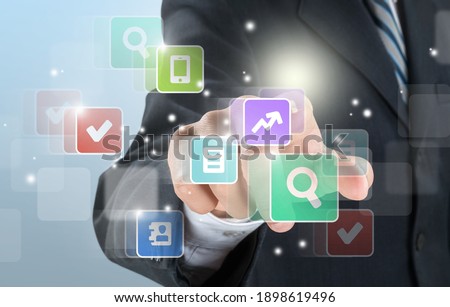 Document Management System, man with infographic. Concept with business manager pointing to icons.