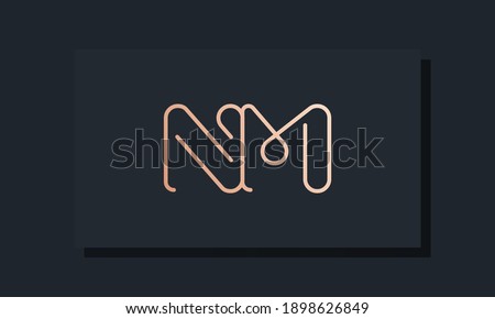 Minimal clip initial letter NM logo. This logo inspiration from clip typeface.It will be suitable for which company or brand name start those initial.