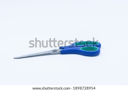 scissors on white background. a tool used in cutting.
