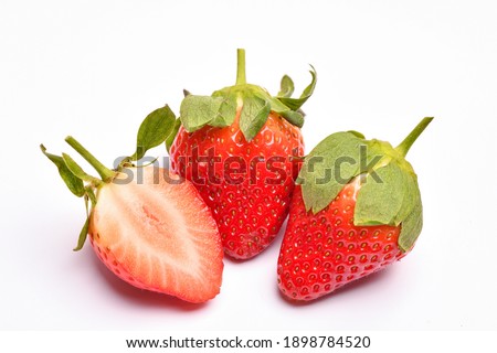 Fresh Red Strawberries isolated on white background. Macro Shoot