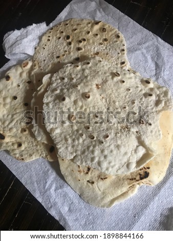Homemade tortillas, freshly stacked.￼￼, ready to be made into a tacos￼