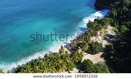 
Base-G Beach, Tanjung Ria, Jayapura City, Papua, Indonesia: a beautiful afternoon on the right Base-G beach, empty of visitors due to the Covid-19 pandemic (12 Jan 2021) Royalty-Free Stock Photo #1898852206
