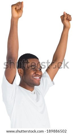 Excited handsome football fan cheering on white background
