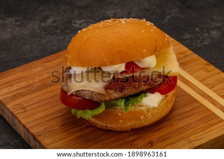 Delicous burger with tuna fish and cheese