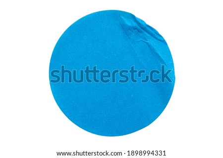 Blank blue round adhesive paper sticker label isolated on white background
