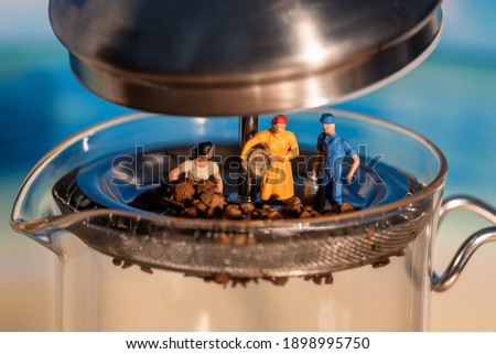 Coffee grinding scene animation using miniature figures.