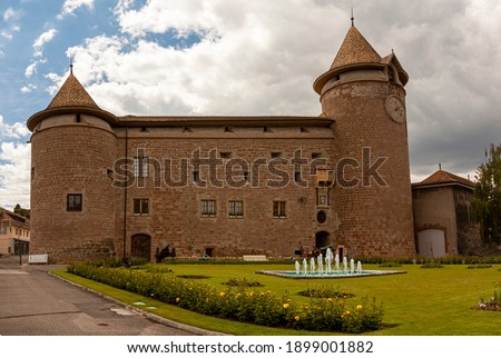 Chateau de Morges (Morges Castle) is a 13th century Swiss fort with a square floor plan and four round corner towers and brick exterior. It is currently home to a military museum.