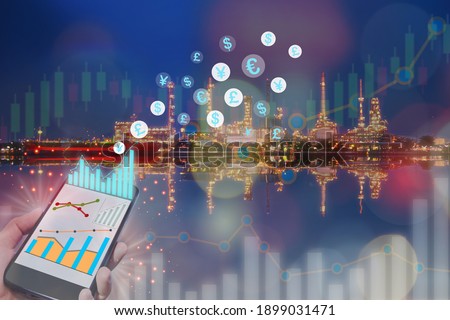 Economic recovery with growth graphs on smartphone and currency symbol on power and energy industry background. Artificial intelligence innovation concept and fintech digital transformation idea Royalty-Free Stock Photo #1899031471