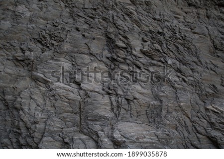 Stones texture and background. 
Surface of the cave rock wall. Rock texture