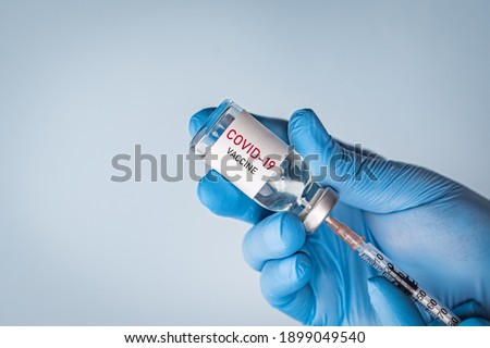 Coronavirus vaccine concept and background. New vaccine for COVID-19 pandemic. Royalty-Free Stock Photo #1899049540