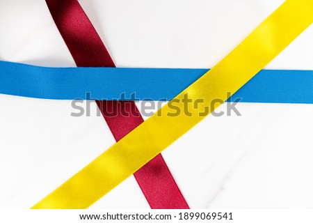 Multiple color ribbon tapes on the table