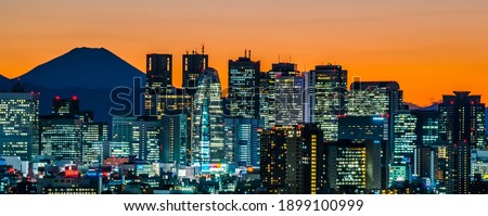 Japan, Tokyo sunset, skyscrapers in Shinjuku and silhouette of Mt.Fuji