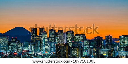 Japan, Tokyo sunset, skyscrapers in Shinjuku and silhouette of Mt.