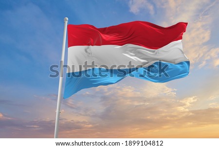 Large Luxembourg flag waving in the wind