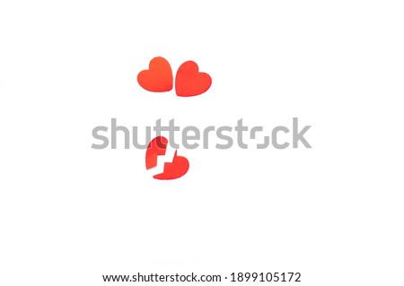 3 red paper heart cut on isolated white background with place for text