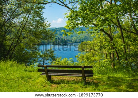 Rursee at Eifel National Park, Germany. Scenic view of lake Rursee and surrounded green hills in North Rhine-Westphalia Royalty-Free Stock Photo #1899173770