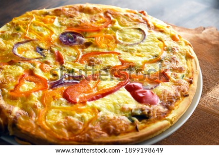 Vegetable pizza on a plate. 