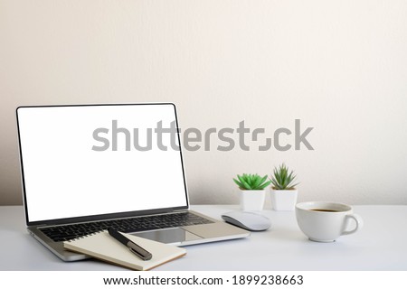 White office desk table with keyboard of laptop, coffee cup and notebook, mouse computer with equipment office supplies. Business and finance concept. Workplace, Flat lay with blank copy space. Royalty-Free Stock Photo #1899238663