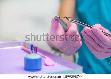 Preparing for Endodontic Root Canal Treatment Royalty-Free Stock Photo #1899298744