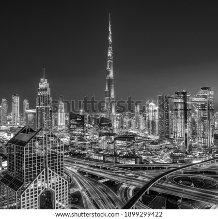 Dubai - city center skyline and bussy evening ruch hour traffic, United Arab Emirates