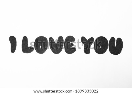 Handwritten text I Love You on white background