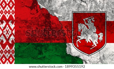 Concept of a Conflict between Government and the Opposition in Belarus with painted flags on a wall with a crack