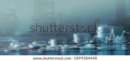 Financial investment concept, Double exposure of city night and stack of coins for finance investor, Forex trading candlestick chart economic, ECN Digital economy, business, money, passive income. Royalty-Free Stock Photo #1899384448