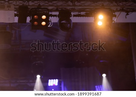 theater scene, stage light with colored spotlights and smoke