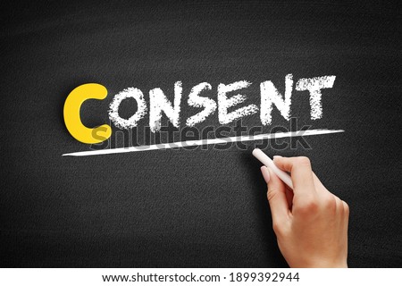 Consent - permission for something to happen or agreement to do something, text concept on blackboard Royalty-Free Stock Photo #1899392944