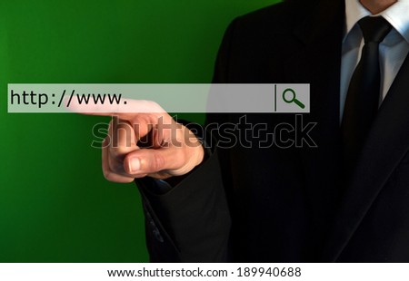 Businessman touching a virtual internet search bar