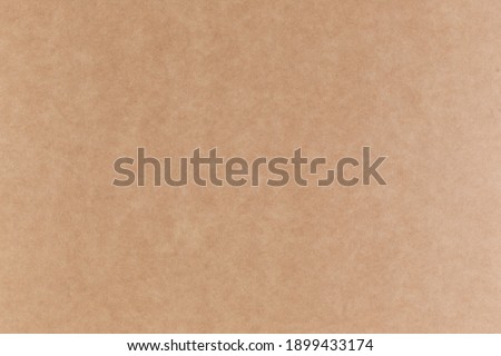 Craft sheet of paper or cardboard, abstract texture background.