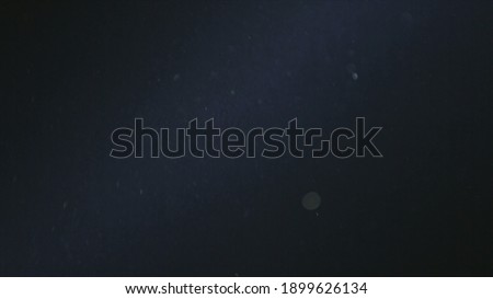Natural Dust Organic Floating particles in stage light ray. Photo texture banner, wallpaper for your web site project, titles, overlay and etc... For print big wallpaper, your logo background. Royalty-Free Stock Photo #1899626134