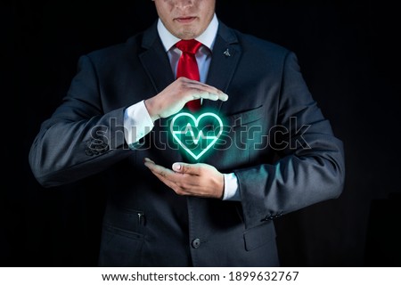 businessman at work with good attitude. Adult over 20 years old, working with holographic technology.