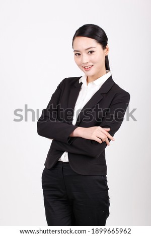 A young business woman in a suit high quality photo