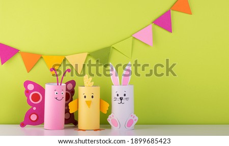 handmade toilet paper roll toys for children, bunnies butterflies birds. needlework is a craft made of paper. Recycling Royalty-Free Stock Photo #1899685423