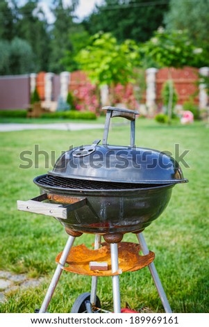 Grilling theme with barbecue stuff. Kettle barbecue grill.
