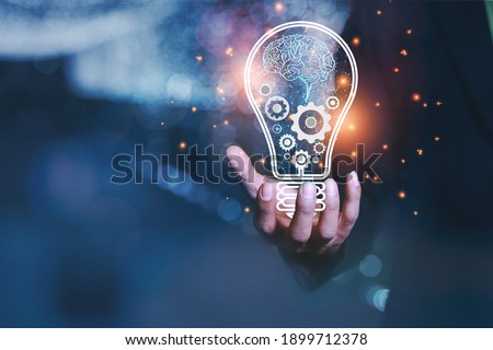 Brain development business ideas, business people show creative ideas to modernize the work processes of the brain with a cog in driving.
 Royalty-Free Stock Photo #1899712378